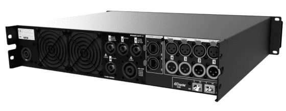 A black and silver amplifier with many different inputs.
